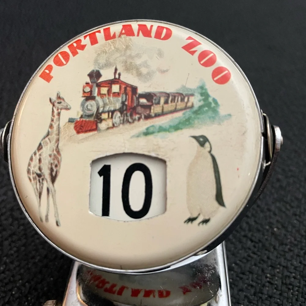 VTG metal perpetual flip calendar featuring Portland Zoo graphic